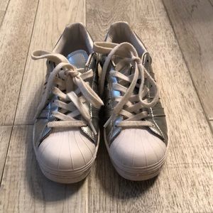Silver and white Adidas